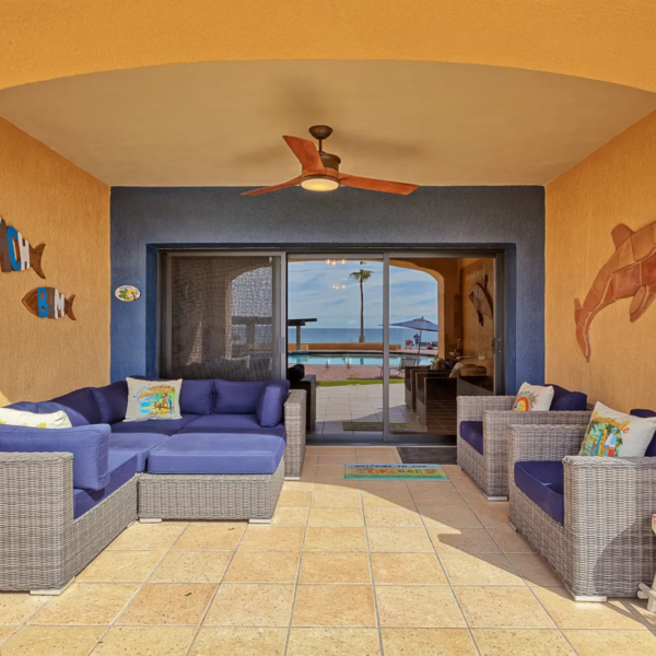 View from a wide covered veranda looking out toward the pool and the Sea of Cortez.