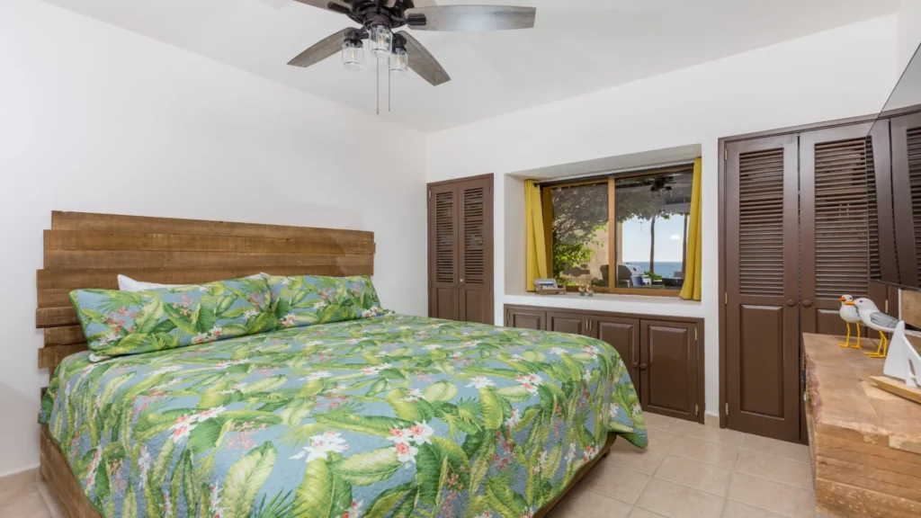 Beachfront master bedroom with king bed at Sandy Beach condo