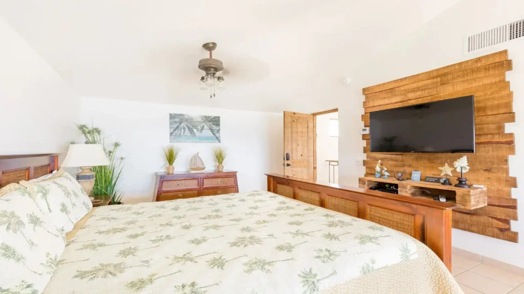 Bedroom with calming sea inspired colors and comfortable bed