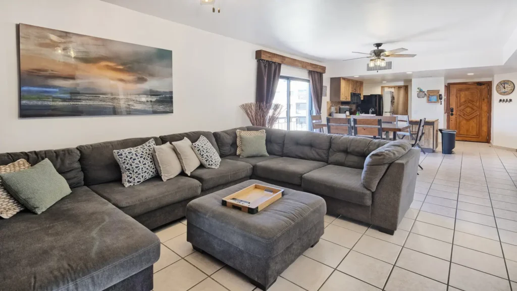 Large open living room inside beachfront penthouse condo