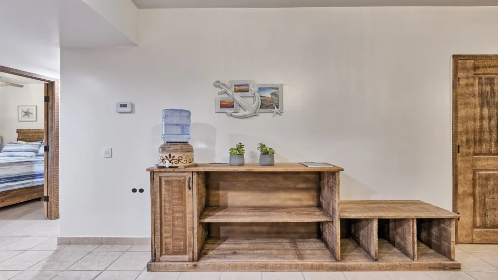 Coastal decor and storage details throughout beachfront vacation condo