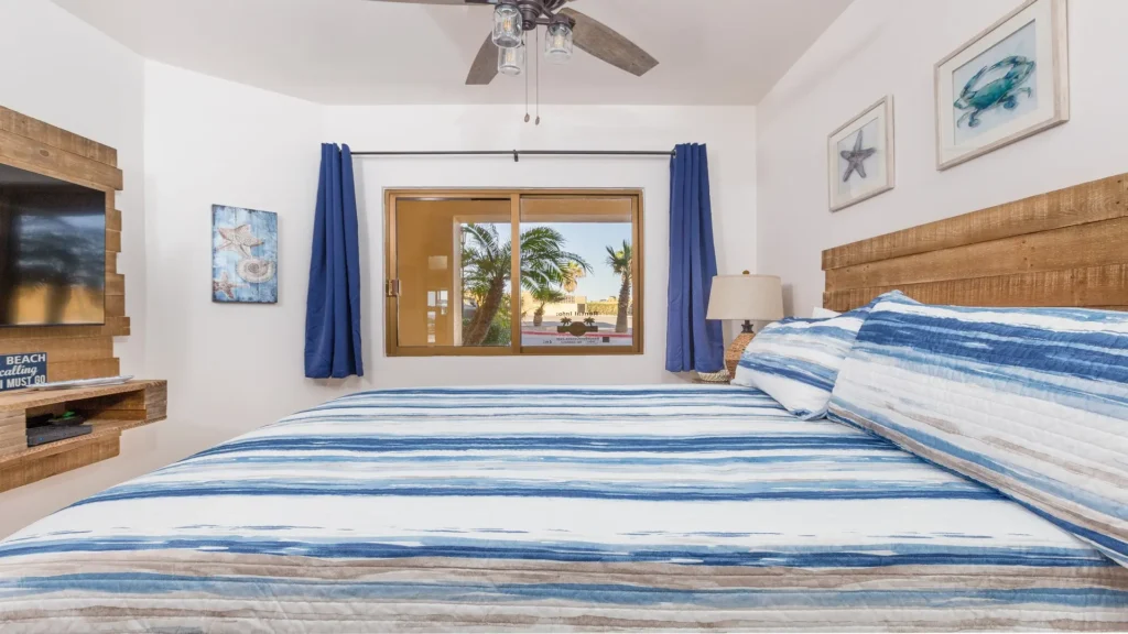 Bedroom with ocean-inspired decor and Baja style accents