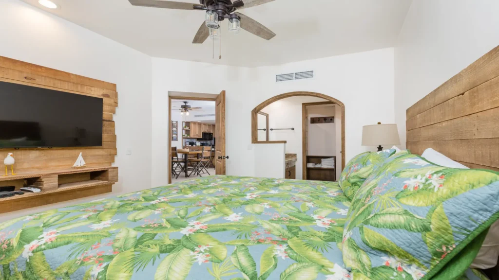 Ground floor beachfront master suite with king bed and relaxing decor