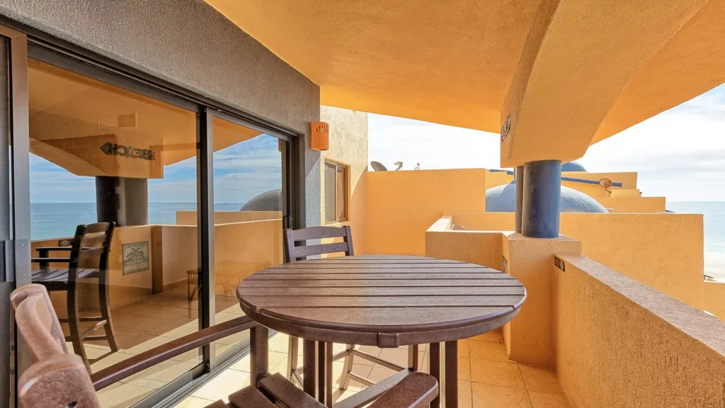 Private balcony dining area at Princesa Sandy Beach viewed from the E501 2BD two-story penthouse in Rocky Point.