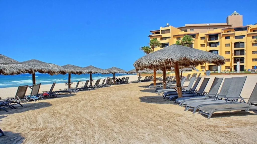 View from 3BD D503 of the Princesa Resort sandy beach, highlighting the pristine waters perfect for swimming at Rocky Point Sandy Beach.