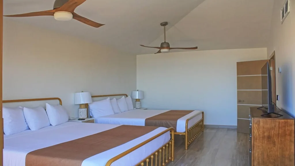 Princesa Resort D503 penthouse second floor bedroom in 3BD D503, featuring two comfortable King beds for spacious and luxurious sleeping at Rocky Point Sandy Beach.