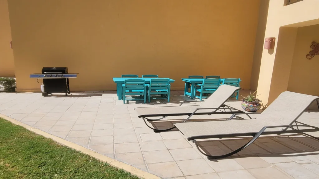 Oversized patio that greatly extends your living space, perfect for relaxing, gathering, and enjoying the open-air atmosphere.