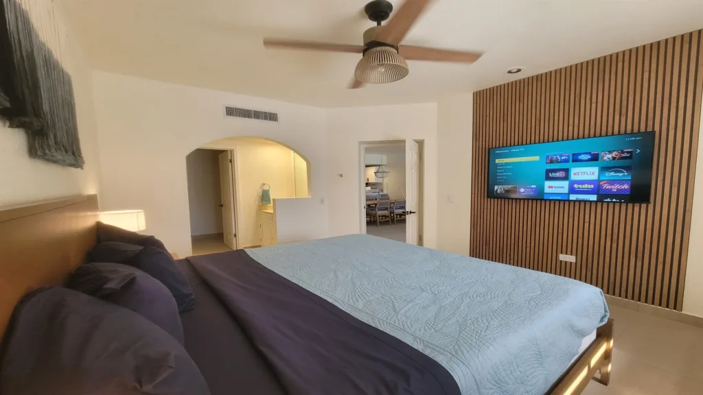 Relax in the king bed and enjoy your favorite movies and shows in comfort after a day at the beach or pool.